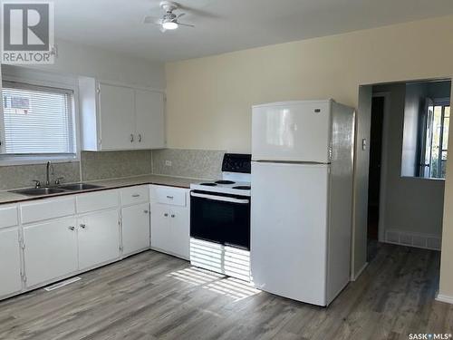 1021 Ominica Street E, Moose Jaw, SK - Indoor Photo Showing Kitchen With Double Sink