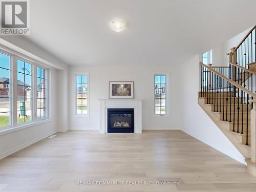 99 Golden Meadows Drive, Otonabee-South Monaghan, ON - Indoor Photo Showing Living Room With Fireplace