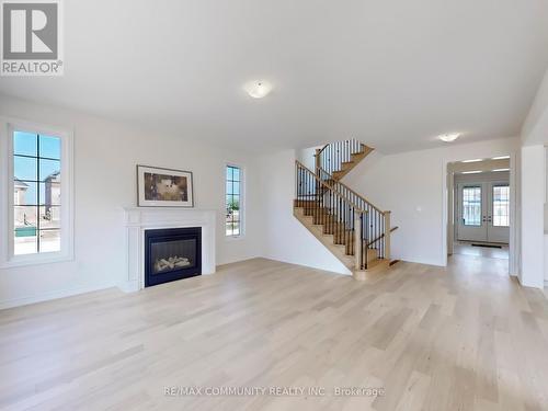 99 Golden Meadows Drive, Otonabee-South Monaghan, ON - Indoor Photo Showing Living Room With Fireplace