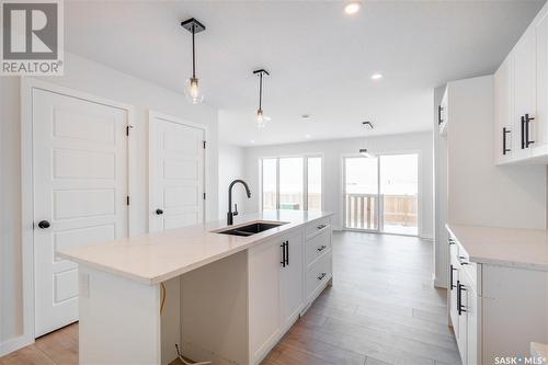 8620 Wheat Crescent, Regina, SK - Indoor Photo Showing Kitchen With Double Sink With Upgraded Kitchen