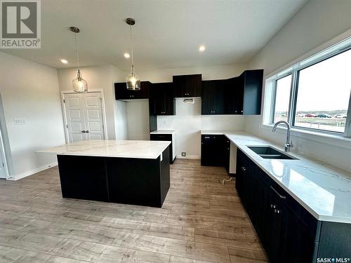 1125 Camden Gardens, White City, SK - Indoor Photo Showing Kitchen With Double Sink