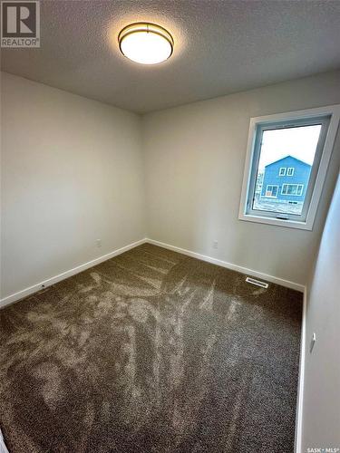 1125 Camden Gardens, White City, SK - Indoor Photo Showing Other Room