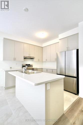 46 Povey Road, Centre Wellington, ON - Indoor Photo Showing Kitchen With Double Sink