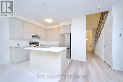 46 Povey Road, Centre Wellington, ON - Indoor Photo Showing Kitchen With Double Sink