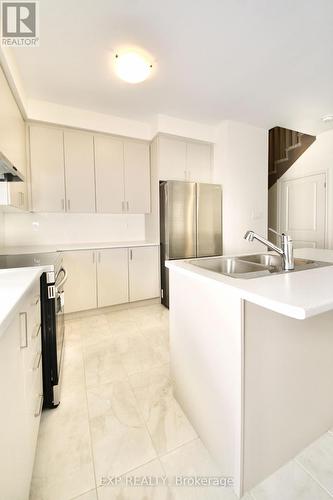 46 Povey Road, Centre Wellington, ON - Indoor Photo Showing Kitchen With Double Sink