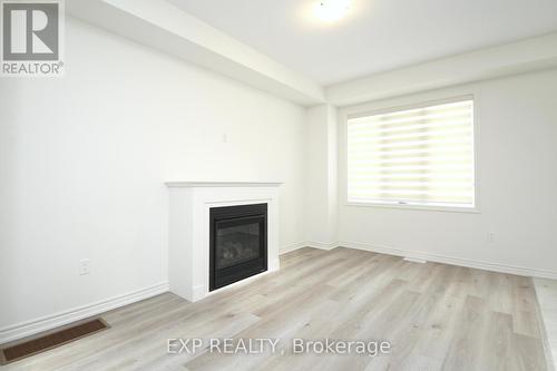 46 Povey Road, Centre Wellington, ON - Indoor Photo Showing Living Room With Fireplace