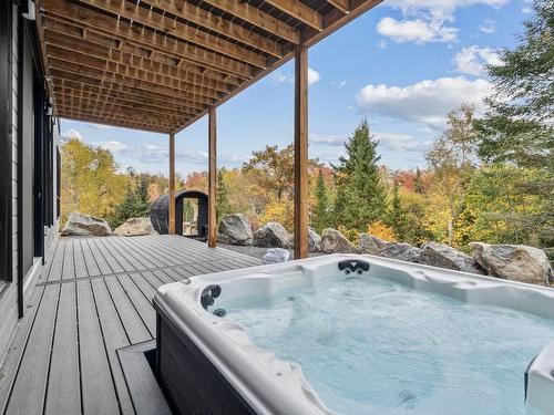 Hot tub - 50 Rue Du Mont-Logan, La Conception, QC - Outdoor With Deck Patio Veranda With Exterior