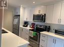 2 - 601 Old Orchard Grove, Toronto, ON  - Indoor Photo Showing Kitchen With Double Sink 