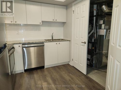 507 - 2791 Eglinton Avenue E, Toronto, ON - Indoor Photo Showing Kitchen With Double Sink