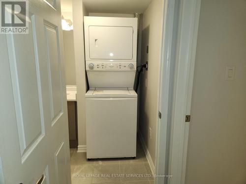 507 - 2791 Eglinton Avenue E, Toronto, ON - Indoor Photo Showing Laundry Room