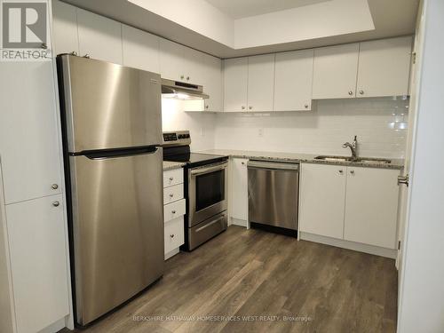 507 - 2791 Eglinton Avenue E, Toronto, ON - Indoor Photo Showing Kitchen With Stainless Steel Kitchen