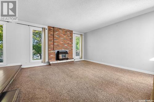 63 Noonan Road, Regina, SK - Indoor With Fireplace