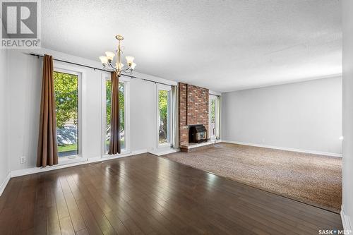 63 Noonan Road, Regina, SK - Indoor Photo Showing Other Room With Fireplace