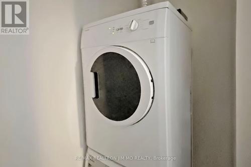 2304 - 1 Bloor Street E, Toronto, ON - Indoor Photo Showing Laundry Room