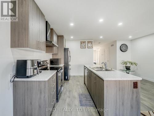 16 Roper Place, Kitchener, ON - Indoor Photo Showing Kitchen With Double Sink