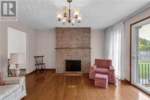 424 Mercier Avenue W, Cornwall, ON - Indoor Photo Showing Living Room With Fireplace