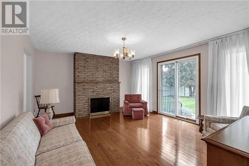 424 Mercier Avenue W, Cornwall, ON - Indoor Photo Showing Living Room With Fireplace