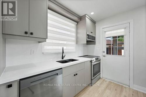 107 Lomar Drive, Toronto, ON - Indoor Photo Showing Kitchen With Double Sink With Upgraded Kitchen