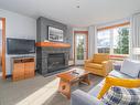 Salon - 329-140 Ch. Au Pied-De-La-Montagne, Mont-Tremblant, QC  - Indoor Photo Showing Living Room With Fireplace 