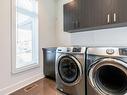 Salle de lavage - 7710 Rue De Liverpool, Brossard, QC  - Indoor Photo Showing Laundry Room 