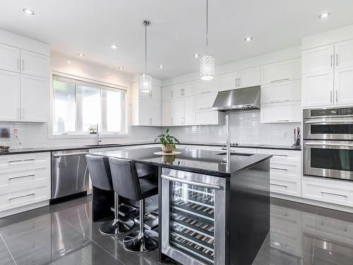 Cuisine - 7710 Rue De Liverpool, Brossard, QC - Indoor Photo Showing Kitchen With Upgraded Kitchen