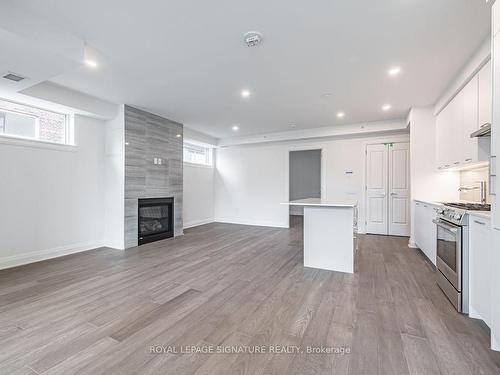 202-285 Avenue Rd, Toronto, ON - Indoor Photo Showing Kitchen With Fireplace