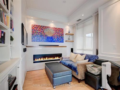 2603-35 Hayden St, Toronto, ON - Indoor Photo Showing Living Room With Fireplace