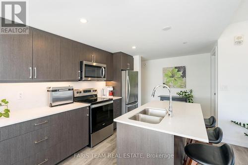 812 - 58 Lakeside Terrace, Barrie, ON - Indoor Photo Showing Kitchen With Double Sink With Upgraded Kitchen