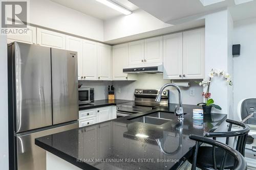 1034 - 3045 Finch Avenue E, Toronto, ON - Indoor Photo Showing Kitchen With Stainless Steel Kitchen With Double Sink