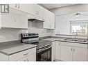 4800 Heritage Drive Unit# 3, Vernon, BC  - Indoor Photo Showing Kitchen With Double Sink 