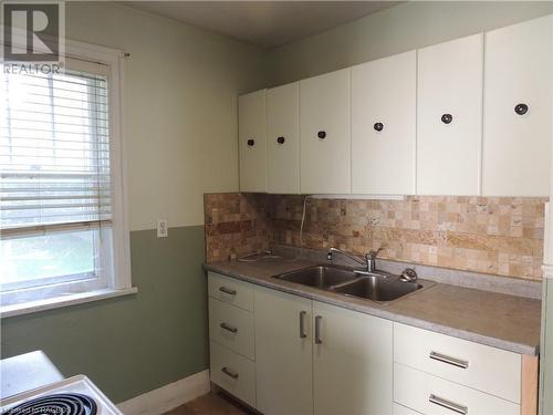 151 Countess Street N, Durham, ON - Indoor Photo Showing Kitchen With Double Sink