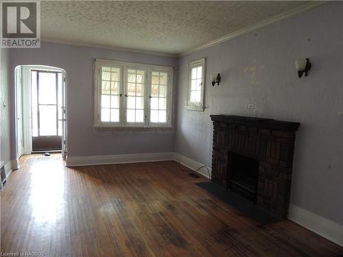 151 Countess Street N, Durham, ON - Indoor With Fireplace