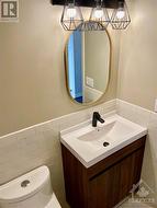 Lower level powder room - 