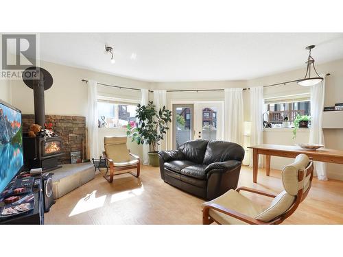 7307 Prospector Avenue Unit# 601, Radium Hot Springs, BC - Indoor Photo Showing Living Room With Fireplace