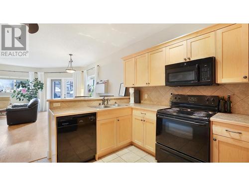 7307 Prospector Avenue Unit# 601, Radium Hot Springs, BC - Indoor Photo Showing Kitchen With Double Sink