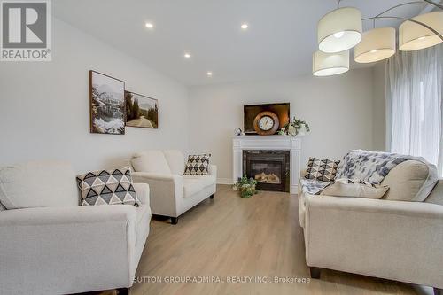 26 Oakmont Avenue, Oro-Medonte, ON - Indoor Photo Showing Living Room With Fireplace