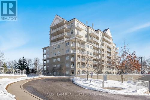 214 - 354 Atherley Road, Orillia, ON - Outdoor With Facade