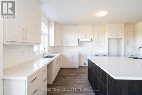 60 Wood Crescent, Essa, ON - Indoor Photo Showing Kitchen With Double Sink