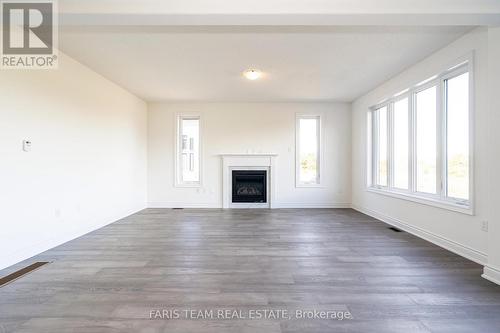 60 Wood Crescent, Essa, ON - Indoor Photo Showing Living Room With Fireplace