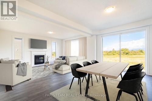 60 Wood Crescent, Essa, ON - Indoor Photo Showing Other Room With Fireplace