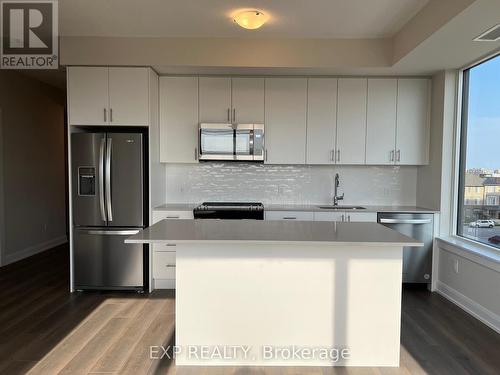 407 - 3220 William Coltson Avenue, Oakville, ON - Indoor Photo Showing Kitchen With Stainless Steel Kitchen With Upgraded Kitchen