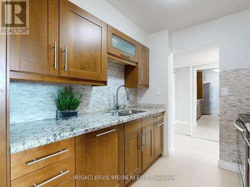 Ph 4 - 5 Vicora Linkway Way, Toronto, ON - Indoor Photo Showing Kitchen With Double Sink