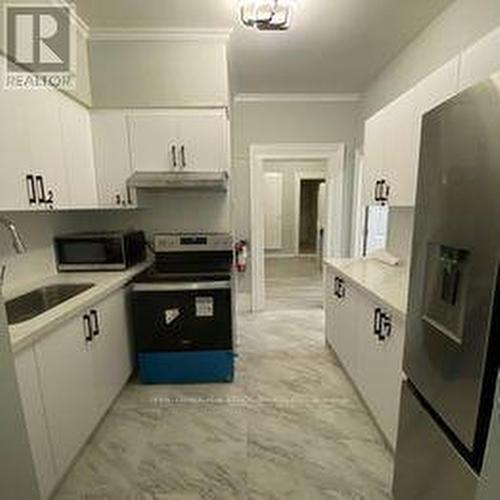 106 - 206 Carlton Street, Toronto, ON - Indoor Photo Showing Kitchen