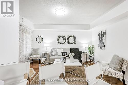 109 - 200 Mclevin Avenue, Toronto, ON - Indoor Photo Showing Living Room