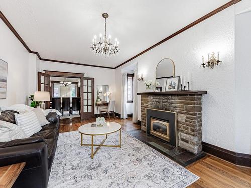 35 Joseph St, Toronto, ON - Indoor Photo Showing Living Room With Fireplace