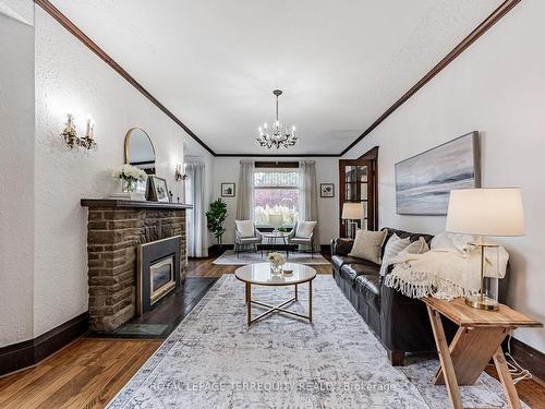 35 Joseph St, Toronto, ON - Indoor Photo Showing Living Room With Fireplace