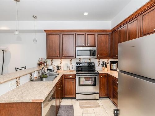 316-1325 Bear Mountain Pkwy, Langford, BC - Indoor Photo Showing Kitchen With Double Sink