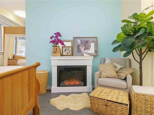 205-868 Orono Ave, Langford, BC - Indoor Photo Showing Living Room With Fireplace