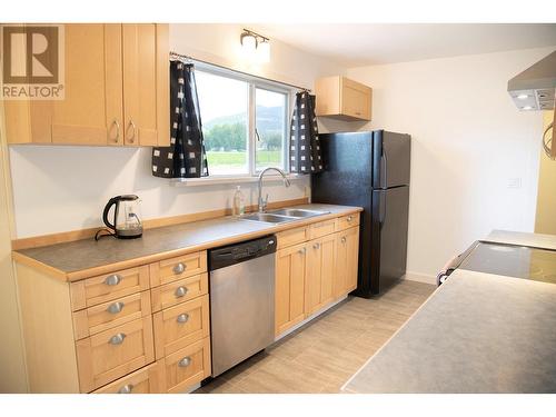 9660 School Road, Coldstream, BC - Indoor Photo Showing Kitchen With Double Sink