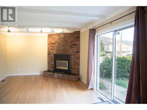 9660 School Road, Coldstream, BC - Indoor Photo Showing Living Room With Fireplace